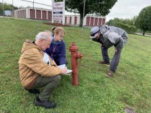 Paul Pasko, Electro Scan, Zeda Hillis, J.C. Haley, and Douglas Cole, Spencer Utility, evaluating insertion points for entry into the City's potable water network.