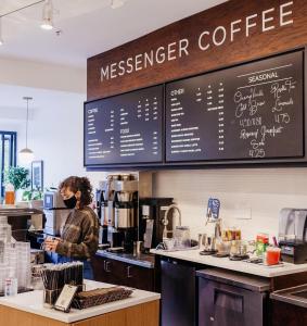 Photo showing the interior of a new Messenger Coffee cafe opening on Kansas City's Country Club Plaza on May twelth, twenty-twenty one.