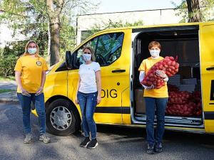 Their bright yellow van was filled with Mother’s Day gifts and bags of potatoes, onions and other durable food.