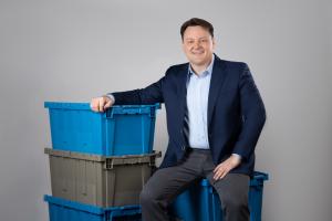 Tim Debus, CEO of the Reusable Packaging Association honored by World Biz Magazine