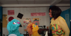 Sesame Street Muppets Zobi and Kami interact with actress Matilda Asante in a video for the Techniques for Effective Teaching (TFET) programme.