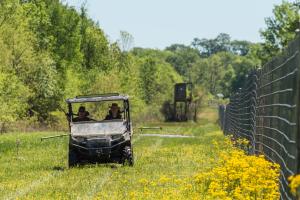 Natural creeks, carefully designed interior road system, and miles of trails and lanes wind to all corners of the property, safe within seven miles of high fence that keep its top-tier whitetail population safe (and predators and wild pigs out).
