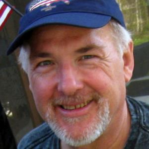 Headshot of Clark Ford wearing baseball cap.