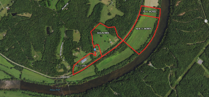 Bluebird Hill Farm is a 102.77± ac Albemarle County farm with a 3 bedroom 2 bath brick home, 2 high quality barns w/offices, equestrian center/arena w/office & living quarters, pastures, paddocks & fencing, 6 wells & multiple waterers and frontage on the James River