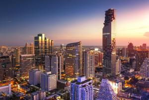 The building spirals up within the Bangkok skyline, iconic and inviting from first look.
