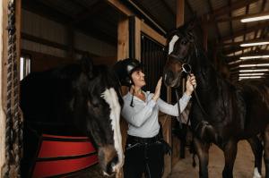 Asbury University Equine Student with Two Horses