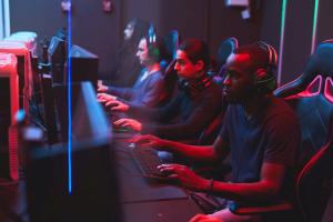 A team of people playing video games together