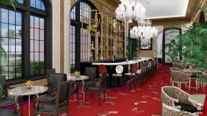 The Grand Galvez bar incorporates elegant designs with white marble flooring and black framing, crystal chandeliers throughout and royal burgundy carpets and accent draperies.