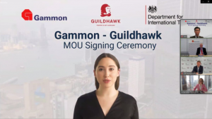 Video screenshot of female Guildhawk Voice multilingual avatar opening the Gammon Construction Guildhawk MoU signing ceremony in Hong Kong and London