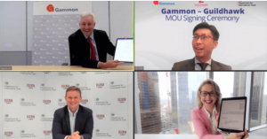 Screen shot from Zoom of Gammon CTO Paul Evans, Guildhawk CEO Jurga Zilinskiene MBE and Director General Nick Heath during the MoU signing ceremony in Hong Kong and London opened by a Guildhawk Voice Multilingual Avatar speaking English and Cantonese