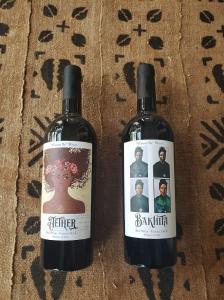 Aether and Bakhita wine bottles