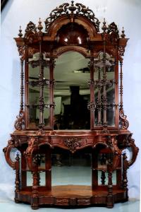 Furniture pieces attributed to Thomas Brooks include this rosewood Victorian etagere with white marble top and bow front, 102 inches tall. Estimate: $5,000-$7,500.