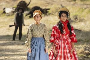 Tammy Dahlstrom (L) and Geraldine Viswanathan (R) hit the trail starring in Season 3 of TBS comedy 'Miracle Workers Oregon Trail'; premiering July 13, 2021