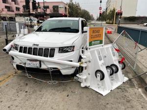 Jeep stopped safely by beam gate