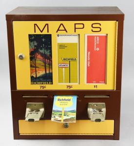 Vintage map coin-op vending machine filled with 54 vintage maps from the 1930s to the 1970s. Estimate: $200-$600.