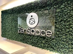 StartUp Remote Work Green Wall Brand Logo Signage ZenSpace Coworking Lounge at Westfield Oakridge Mall