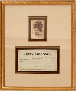 This framed cabinet card photo of prostitute “Amelia” from 1898, with her business license, is expected to sell for $5,000-$10,000.