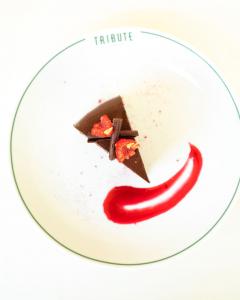 Chocolate cake on white plate