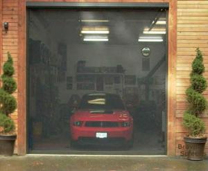 Motorized screen Garage