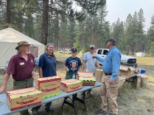 Fresh Washington state cherries being given to frontline workers - wildland firefighters - at a fire camp in Eastern Washington State.