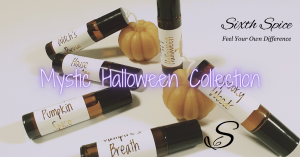 This is a photo of a new collection of natural essential oil based perfumes.  It is a collection designed by Sixth Spice.  They are 10 milimeter amber brown colored glass bottles with shiny gold foiled labels.  They are placed among mini pumpkin candles t