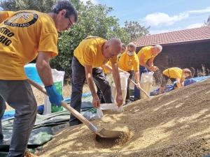  Scientology Volunteer Ministers helped local farmers by shoveling more than four tons of barley into 55-pound sacks, each enough to feed a cow for a week or a sheep for 4 to 5 weeks.