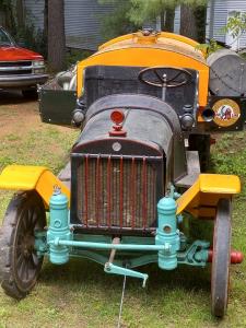 Open-top 1920 Acme tanker truck, manufactured in Cadillac, Michigan and once used to haul gasoline from the Michigan oil refineries to gas stations.