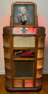 Late 1930s or early 1940s Jennings Telephone Music jukebox, playing electronically or mechanically with the help of an operator.