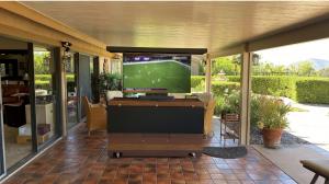 Cabinet Tronix's Outdoor Mobile TV Lift Cabinet Bar & Fridge Stunner has everything you need in one piece of outdoor furniture -- a beautiful TV lift cabinet with built-in bar and refrigerator, and it's on high-end casters so you can easily roll it wherev