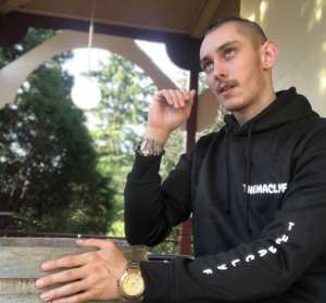 themaclyf in his own branded clothing