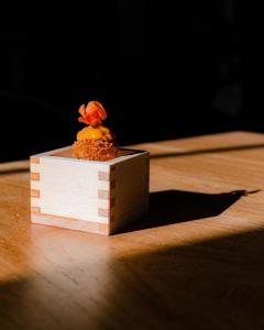Japanese croquette with uni and fermented carrot at Restaurant Nisei
