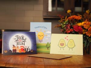 A group of three greeting cards