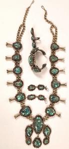Vintage No. 8 Mine turquoise jewelry set (Navajo Reservation, Ariz.) having a magnificent squash blossom necklace with 12 squash blossoms ($5,125).