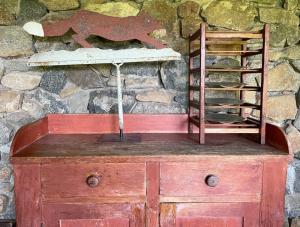 Antique jelly cupboard in red paint and a few country antiques.