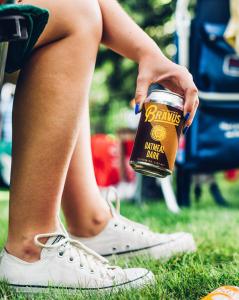 Enjoy a refreshing Bravus non-alcoholic Blonde Ale by the lake