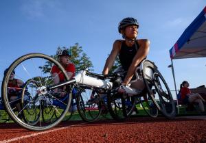 Hannah Dederick in her racing wheelchair on the track before competing in a race