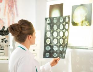 Doctor looking at Neuro MRI