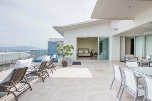 Luxury two-story penthouse with ocean-view terrace