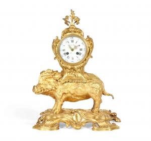 19th century Louis XV style gilt bronze boar form mantel clock (estimate: $3,000-$5,000).