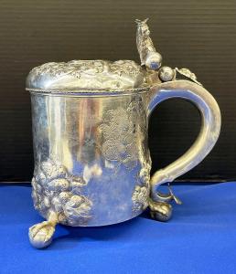 This Scandinavian peg tankard with Danish Coronation medal sold for $10,625.