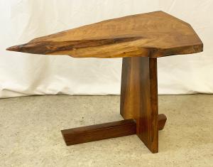 This George Nakashima Minguren side table with unusual triangular-form free-edge top sold for $8,750.