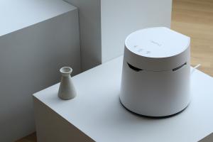 Carepod One humidifier in museum setting on a clean monochrome display