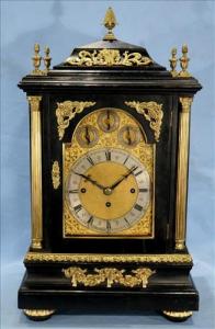 George III style ebonized mahogany triple fusée musical bracket clock with eight nestev bells (estimate: $2,500-$3,500).