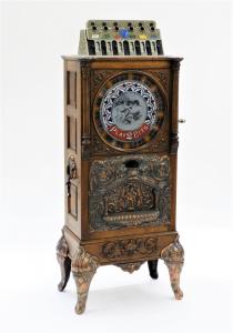 Circa 1904 Caille Brothers (Chicago) Eclipse upright 25-cent slot machine, a 63-inch-tall upright floor wheel model (estimate: $10,000-$15,000).