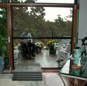 Bravo Screens Introducing the No Blow Out System for Patios, Decks, and Garage Doors with Motorized Retractable Screens