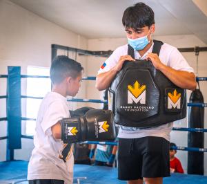 Jimuel Pacquiao one of the sons of PacMan Manny Pacquiao visits kids at boxing club in Long Beach California!
