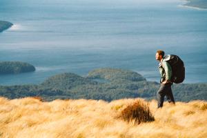 Matthew  Keezer Visits New Zealand Going for a Hike