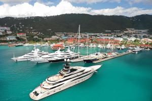250 foot plus sized superyacht preparing to dock at Yacht Haven Grande Marina in the US Virgin Islands