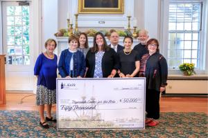 Sheehan Family Companies SVP Deb Lahteine presents ceremonial check to Plymouth Center for the Arts