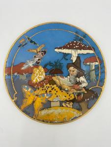 Beautiful Mettlach stoneware charger by Heinrich Schlitt, 17 ½ inches in diameter, the large circular form, signed ($3,321).